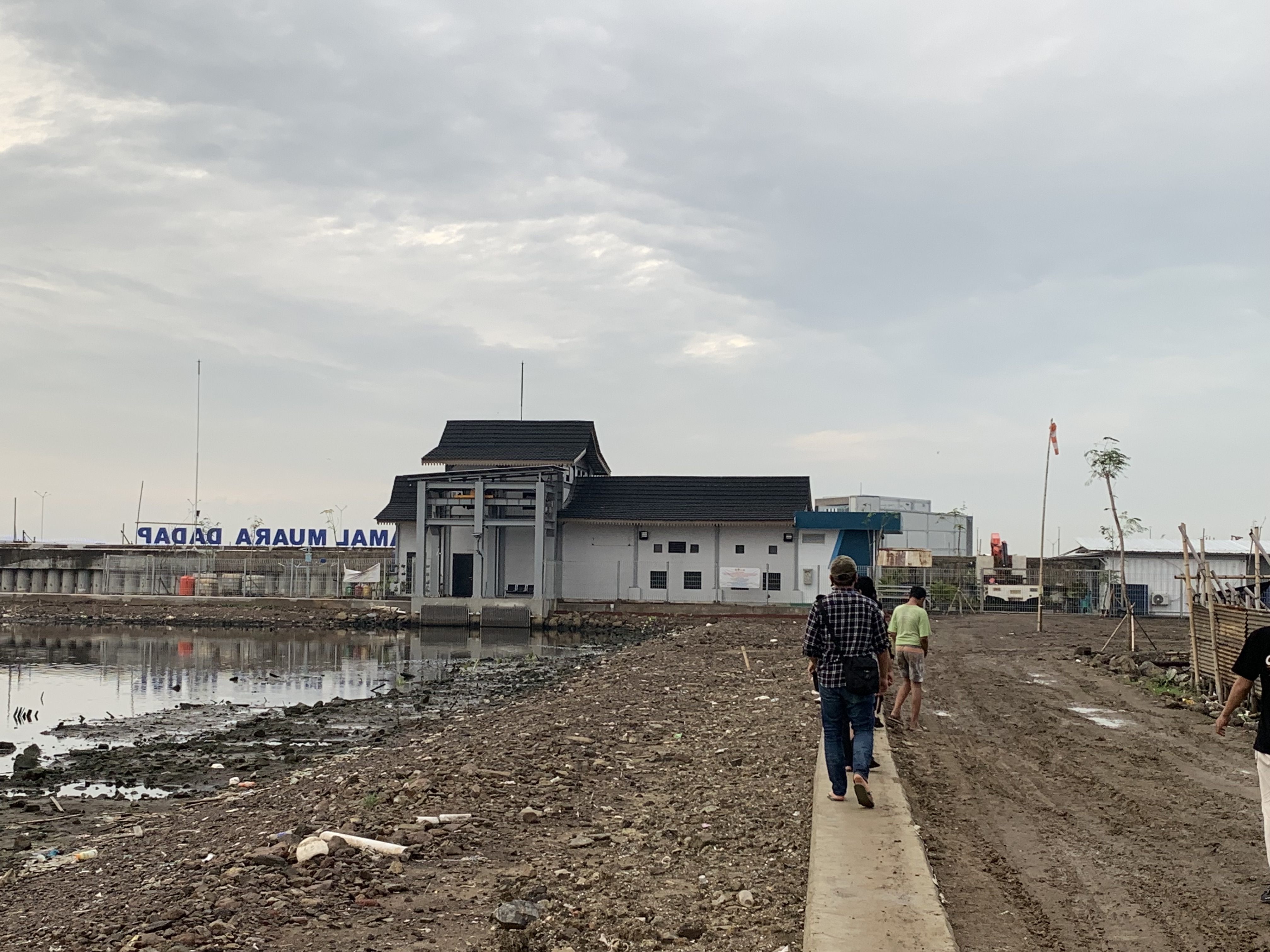 Government infrastructure construction site in Kamal Muara, built without community consultation